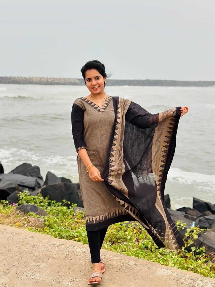 Temple border black suit