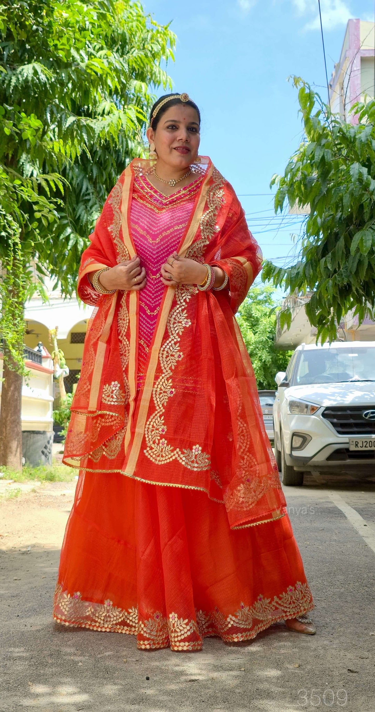 Orange & Pink lehriya Attire